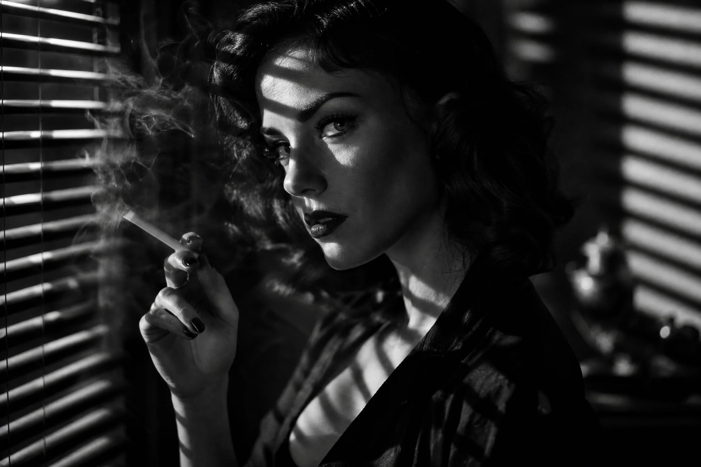 Before and after comparison of black and white film noir portrait with Venetian blind shadows - after