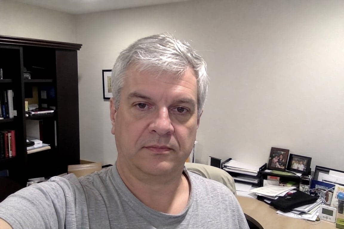 Before applying the Corporate Executive Boardroom Portrait prompt